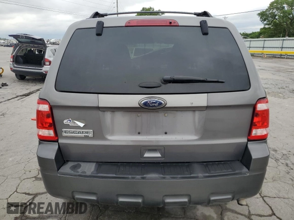 2012 Ford Escape XLT with VIN 1FMCU0D73CKA20143, listed as a Copart auction lot 63111075 with 136,942 mi miles and Salvage title. Bid and sale history available at DreamBid. Image 6.