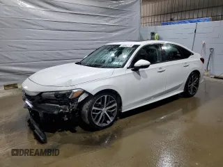 2022 Honda Civic Touring z VIN 2HGFE1F91NH313585, wystawiony jako Copart lot #56042115 z przebiegiem 30 954 mil mil oraz Szkoda całkowita • Salvage title. Historia ofert i sprzedaży dostępna na DreamBid. Obrazek 1.