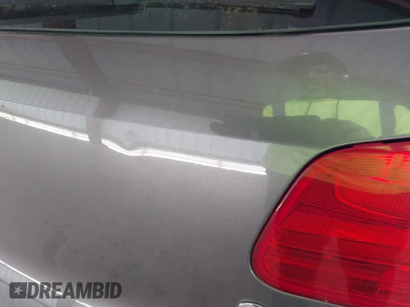 2012 Volkswagen Tiguan SEL with VIN WVGAV7AX1CW004744, listed as a IAAI auction lot 41924952 with 100,964 mi miles and . Bid and sale history available at DreamBid. Image 13.