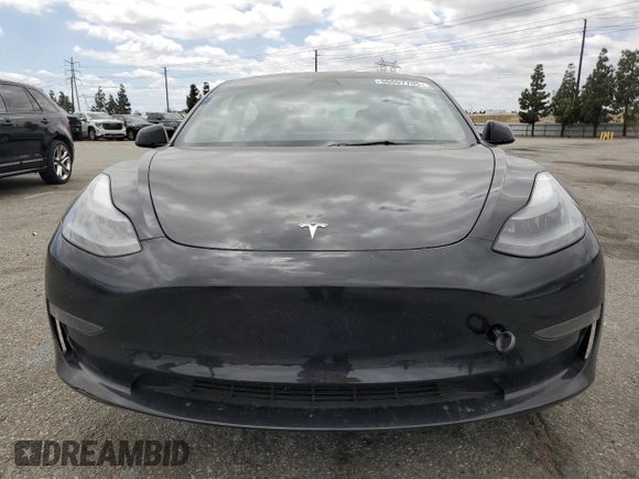 2023 Tesla Model 3 z VIN 5YJ3E1EA7PF600239, wystawiony jako Copart lot #56557705 z przebiegiem 18 851 mil mil oraz Szkoda całkowita • Salvage title. Historia ofert i sprzedaży dostępna na DreamBid. Obrazek 5.