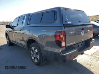 2019 Honda Ridgeline RTL-T with VIN 5FPYK3F67KB027637, listed as a Copart auction lot 53324325 with 70,801 mi miles and Salvage title. Bid and sale history available at DreamBid. Image 2.