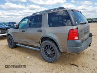 2005 Ford Explorer XLS with VIN 1FMZU62K55UA40924, listed as a Copart auction lot 60080185 with 185,200 mi miles and Salvage title. Bid and sale history available at DreamBid. Image 2.