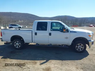 2014 Ford Super Duty F-250 SRW XL with VIN 1FT7W2BT6EEA87011, listed as a IAAI auction lot 41695220 with 130,299 mi miles. Bid and sale history available at carsss.com. Image 13.