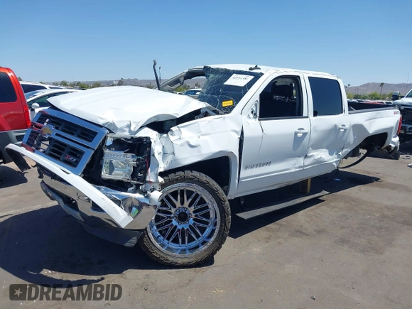 2015 Chevrolet Silverado 1500 LT with VIN 1GCUKREC5FF199331, listed as a IAAI auction lot 42111381 with 180,056 mi miles and . Bid and sale history available at DreamBid. Image 2.