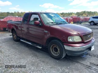 2003 Ford F-150 XL with VIN 1FTRX17203KA95359, listed as a IAAI auction lot 41891118 with 206,393 mi miles. Bid and sale history available at carsss.com. Image 1.