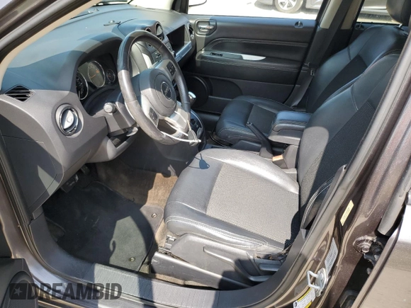 2017 Jeep Compass High Altitude with VIN 1C4NJCEB1HD162898, listed as a Copart auction lot 59175765 with 158,708 mi miles and Salvage title. Bid and sale history available at DreamBid. Image 7.