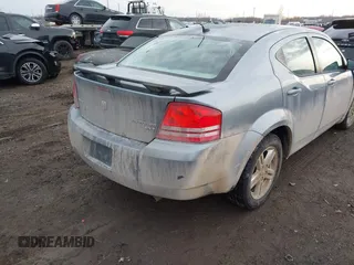 2009 Dodge Avenger SXT with VIN 1B3LC56B09N522736, listed as a IAAI auction lot 41195477 with 100,977 mi miles and . Bid and sale history available at DreamBid. Image 4.