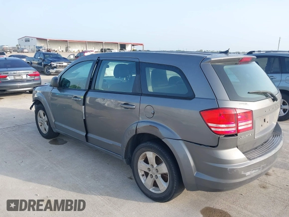 2013 Dodge Journey American Value with VIN 3C4PDCAB8DT586363, listed as a IAAI auction lot 42622716 with 385,195 mi miles and . Bid and sale history available at DreamBid. Image 3.