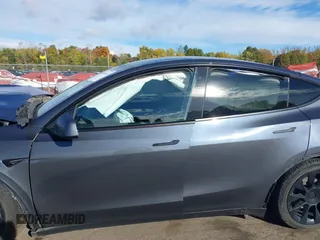 2020 Tesla Model Y Long Range with VIN 5YJYGDEE0LF041762, listed as a IAAI auction lot 40556913 with Not Provided miles and . Bid and sale history available at DreamBid. Image 15.