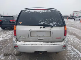 2005 GMC Envoy SLT with VIN 1GKDT13S352258640, listed as a IAAI auction lot 41226997 with 159,665 mi miles. Bid and sale history available at carsss.com. Image 16.