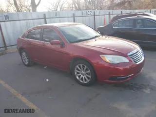 2013 Chrysler 200 Touring with VIN 1C3CCBBB1DN505413, listed as a IAAI auction lot 41893598 with 128,271 mi miles. Bid and sale history available at carsss.com. Image 1.