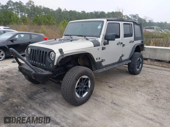 2007 Jeep Wrangler Unlimited X with VIN 1J4GA391X7L107424, listed as a IAAI auction lot 41752013 with 196,557 mi miles and . Bid and sale history available at DreamBid. Image 17.