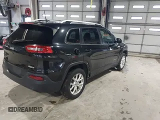 2015 Jeep Cherokee Latitude with VIN 1C4PJMCB5FW768854, listed as a IAAI auction lot 41246213 with 131,112 mi miles. Bid and sale history available at carsss.com. Image 4.