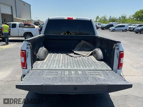 2020 Ford F-150 XL with VIN 1FTEW1E52LFA28138, listed as a IAAI auction lot 42185830 with 146,058 mi miles. Bid and sale history available at carsss.com. Image 1.