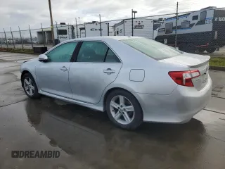 2012 Toyota Camry L with VIN 4T1BF1FK3CU147654, listed as a Copart auction lot 48821515 with 87,217 mi miles and Salvage Title. Bid and sale history available at DreamBid. Image 2.