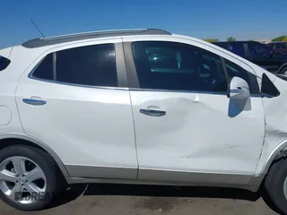2015 Buick Encore with VIN KL4CJASBXFB200731, listed as a IAAI auction lot 42159167 with 53,205 mi miles. Bid and sale history available at carsss.com. Image 13.