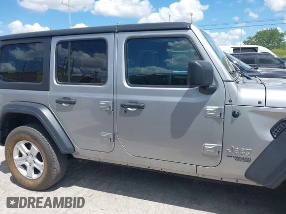 2021 Jeep Wrangler Unlimited Freedom z VIN 1C4HJXDN2MW544730, wystawiony jako IAAI lot #42624402 z przebiegiem 60 993 mil mil oraz . Historia ofert i sprzedaży dostępna na DreamBid. Obrazek 13.