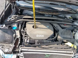 2018 BMW X1 xDrive28i with VIN WBXHT3C32J5K23486, listed as a IAAI auction lot 42387208 with 76,115 mi miles and . Bid and sale history available at DreamBid. Image 10.