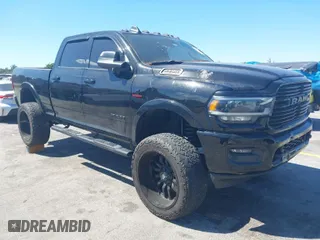 2019 Ram 2500 Laramie with VIN 3C6UR5FLXKG710325, listed as a IAAI auction lot 41853777 with 104,286 mi miles. Bid and sale history available at carsss.com. Image 1.