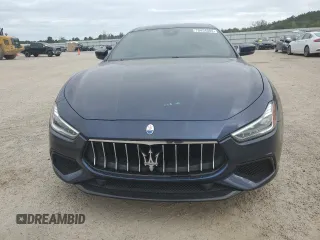 2019 Maserati Ghibli with VIN ZAM57XSS3K1319197, listed as a Copart auction lot 70454084 with 28,584 mi miles and Salvage Title. Bid and sale history available at carsss.com. Image 5.