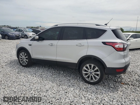 2018 Ford Escape Titanium with VIN 1FMCU9J99JUC89677, listed as a Copart auction lot 60421545 with 98,021 mi miles and Salvage title. Bid and sale history available at DreamBid. Image 2.