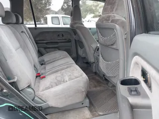 2004 Honda Pilot EX with VIN 2HKYF18494H619509, listed as a IAAI auction lot 42056926 with 185,600 mi miles and . Bid and sale history available at DreamBid. Image 8.