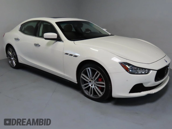 2014 Maserati Ghibli S Q4 z VIN ZAM57RTA7E1094580, wystawiony jako Copart lot #52009445 z przebiegiem 79 463 mil mil oraz Szkoda całkowita • Salvage title. Historia ofert i sprzedaży dostępna na DreamBid. Obrazek 1.