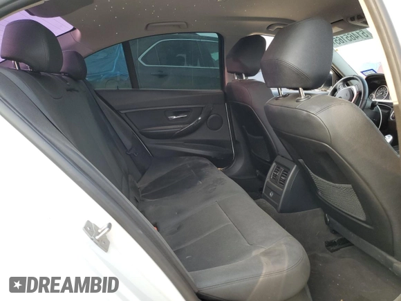 2014 BMW 3 Series 328i with VIN WBA3C1C52EK111563, listed as a Copart auction lot 51465165 with 142,125 mi miles and Salvage title. Bid and sale history available at DreamBid. Image 10.