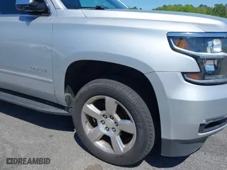 2015 Chevrolet Tahoe LTZ with VIN 1GNSCCKC3FR202934, listed as a IAAI auction lot 41995474 with 258,186 mi miles. Bid and sale history available at carsss.com. Image 17.