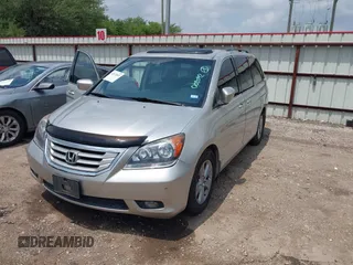 2009 Honda Odyssey Touring z VIN 5FNRL38949B002092, wystawiony jako IAAI lot #42072003 z przebiegiem Nie podano mil oraz . Historia ofert i sprzedaży dostępna na DreamBid. Obrazek 2.