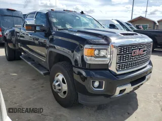 2018 GMC Sierra 3500HD Denali z VIN 1GT42YEY9JF273249, wystawiony jako Copart lot #74801154 z przebiegiem Nie podano mil oraz Nie do naprawy. Historia ofert i sprzedaży dostępna na DreamBid. Obrazek 4.