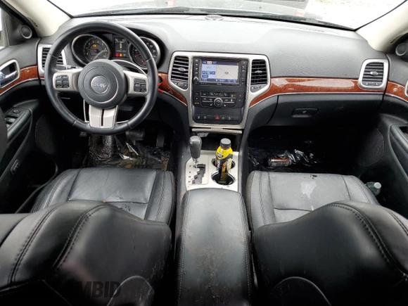 2012 Jeep Grand Cherokee Limited z VIN 1C4RJFBT7CC190025, wystawiony jako Copart lot #47460405 z przebiegiem 140 048 mil mil oraz Szkoda całkowita • Salvage title. Historia ofert i sprzedaży dostępna na DreamBid. Obrazek 8.
