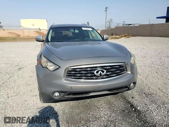 2010 Infiniti FX with VIN JN8AS1MW7AM851892, listed as a Copart auction lot 64990275 with 125,266 mi miles and Salvage title. Bid and sale history available at DreamBid. Image 14.
