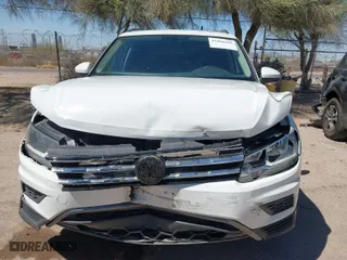 2019 Volkswagen Tiguan SE with VIN 3VV2B7AX1KM092616, listed as a IAAI auction lot 41868660 with 147,419 mi miles. Bid and sale history available at carsss.com. Image 12.