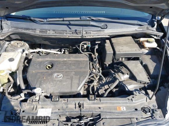 2014 Mazda 5 Sport with VIN JM1CW2BL5E0166522, listed as a IAAI auction lot 41635454 with 94,225 mi miles and . Bid and sale history available at DreamBid. Image 10.