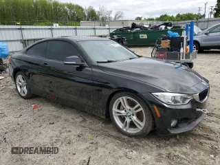 2015 BMW 4 Series 435i with VIN WBA3R1C58FK195520, listed as a Copart auction lot 52079125 with 101,584 mi miles and Salvage title. Bid and sale history available at DreamBid. Image 4.