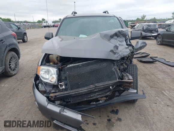 2012 Ford Escape XLT with VIN 1FMCU0D70CKB57640, listed as a IAAI auction lot 42364980 with 122,652 mi miles and . Bid and sale history available at DreamBid. Image 12.