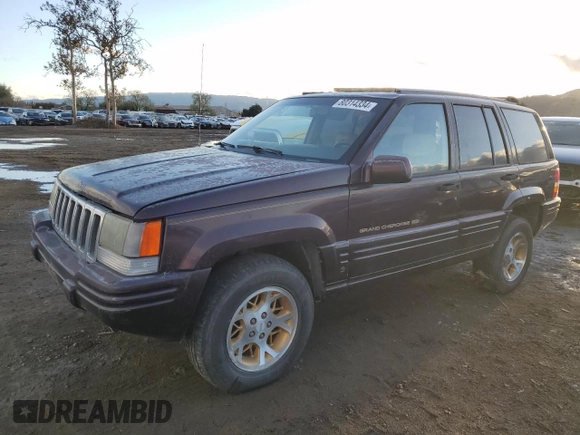 1996 Jeep Grand Cherokee Limited with VIN 1J4GZ78Y3TC182569, listed as a Copart auction lot 80314334 with 302,994 mi miles and Clean Title. Bid and sale history available at carsss.com. Image 1.