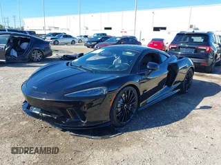 2020 McLaren GT with VIN SBM22GCA1LW000498, listed as a IAAI auction lot 41265247 with 18,465 mi miles. Bid and sale history available at carsss.com. Image 22.