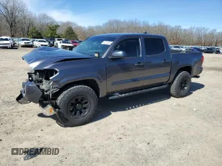 2021 Toyota Tacoma 4WD SR with VIN 5TFCZ5AN6MX252195, listed as a Copart auction lot 48234085 with 56,983 mi miles and Salvage Title. Bid and sale history available at carsss.com. Image 1.