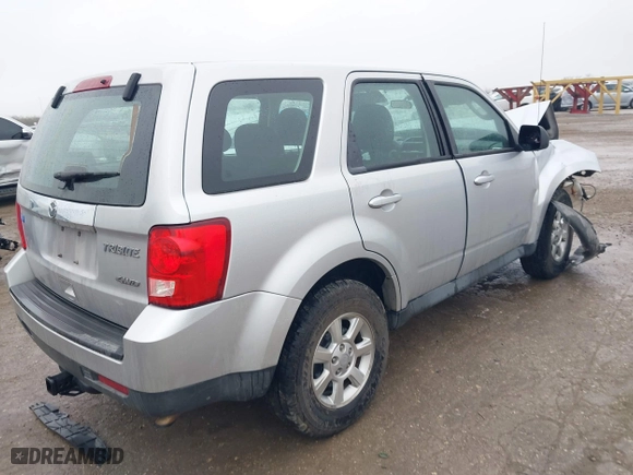 2011 Mazda Tribute Sport with VIN 4F2CY9C7XBKM01050, listed as a IAAI auction lot 41433870 with 122,287 mi miles. Bid and sale history available at carsss.com. Image 4.