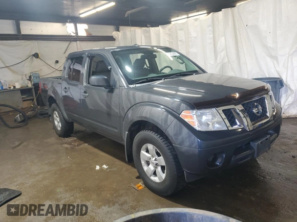2012 Nissan Frontier Pro-4X with VIN 1N6AD0EV4CC422656, listed as a Copart auction lot 60454985 with 152,535 mi miles and Salvage title. Bid and sale history available at DreamBid. Image 4.