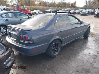 1997 Honda Accord EX with VIN 1HGCD565XVA049579, listed as a IAAI auction lot 40867933 with 189,191 mi miles and . Bid and sale history available at DreamBid. Image 4.