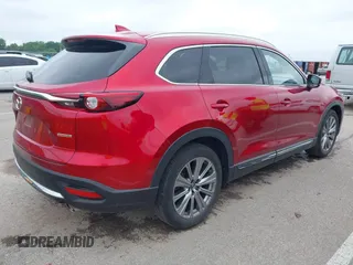 2021 Mazda CX-9 Signature with VIN JM3TCBEY9M0511928, listed as a IAAI auction lot 42231925 with 26,367 mi miles and . Bid and sale history available at DreamBid. Image 4.