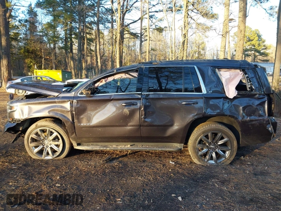 2018 Chevrolet Tahoe LT with VIN 1GNSKBKC7JR234467, listed as a IAAI auction lot 41276741 with 132,327 mi miles and . Bid and sale history available at DreamBid. Image 15.