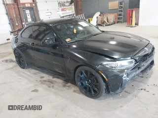 2020 BMW M2 Competition with VIN WBS2U7C09L7F85590, listed as a IAAI auction lot 41836200 with 59,729 mi miles. Bid and sale history available at carsss.com. Image 1.