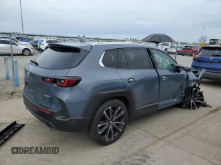 2023 Mazda CX-50 S Premium Plus with VIN 7MMVABEM7PN101642, listed as a Copart auction lot 47498675 with 12,299 mi miles and Salvage Title. Bid and sale history available at DreamBid. Image 3.