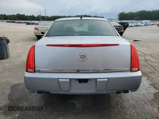 2006 Cadillac DTS 1SC z VIN 1G6KD57Y36U186630, wystawiony jako Copart lot #60792235 z przebiegiem 137 670 mil mil oraz Czysty tytuł • Clean title. Historia ofert i sprzedaży dostępna na DreamBid. Obrazek 6.