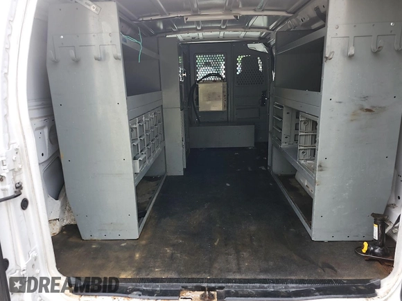 2010 Ford Econoline Cargo Commercial z VIN 1FTNE2EL2ADA74603, wystawiony jako IAAI lot #42511184 z przebiegiem 161 715 mil mil oraz . Historia ofert i sprzedaży dostępna na DreamBid. Obrazek 22.