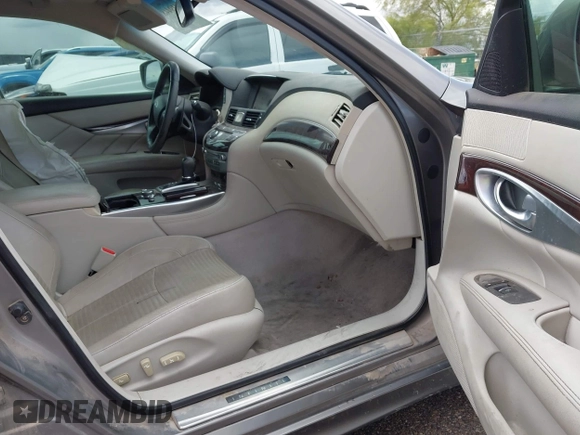 2012 Infiniti M with VIN JN1BY1AP3CM332453, listed as a IAAI auction lot 41944895 with 176,989 mi miles and . Bid and sale history available at DreamBid. Image 5.